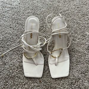 Size 7 Fashion Nova shoes, gently used.